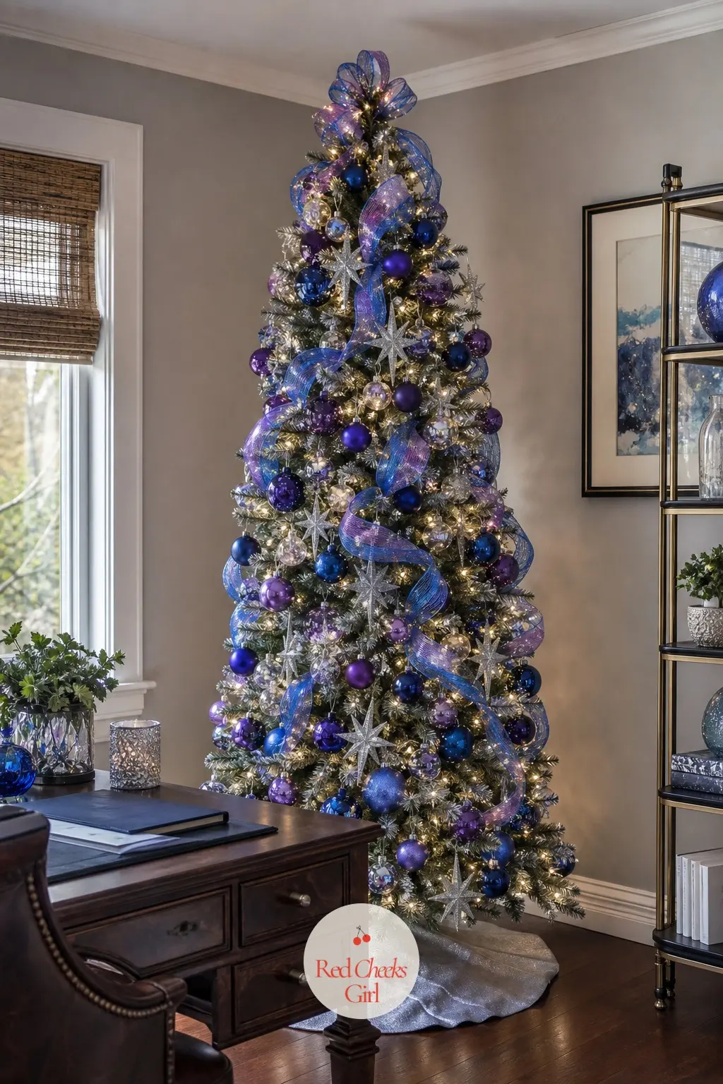 The Towering Tree in Sapphire and Amethyst — This pre-lit artificial tree runs floor to ceiling and uses color-changing lights as the main event, sapphire and
