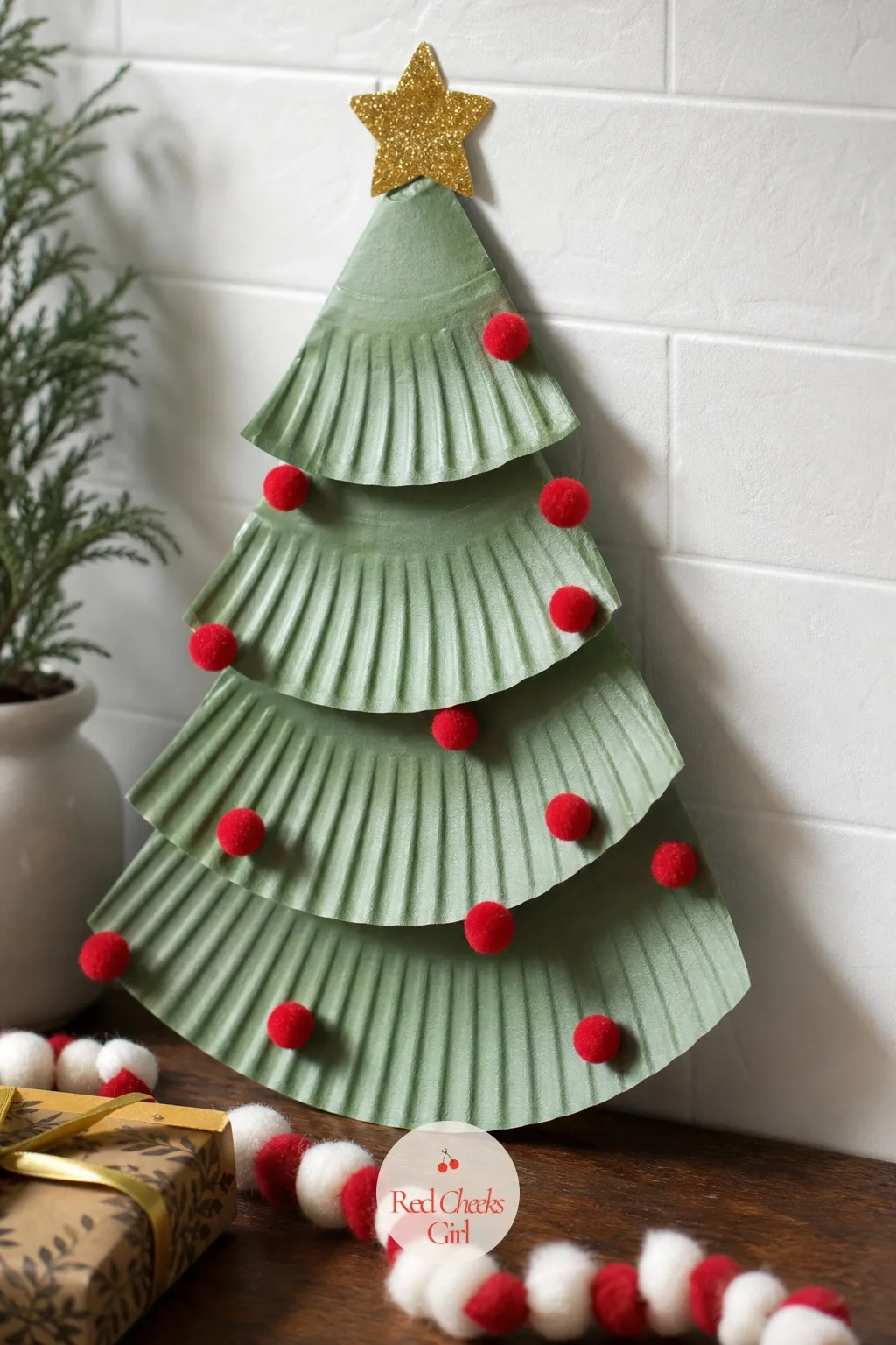 Layered Paper Plate Stack Tree — She wants something that looks like a real tree, not an abstract cone. Christmas tree crafts for kids