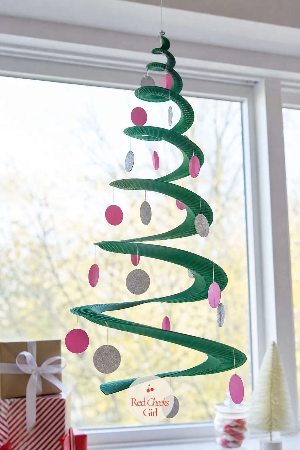 Paper Plate Whirligig Twirling Tree — This one earns the only exclamation mark of the whole list because it actually spins. Christmas tree crafts for kids
