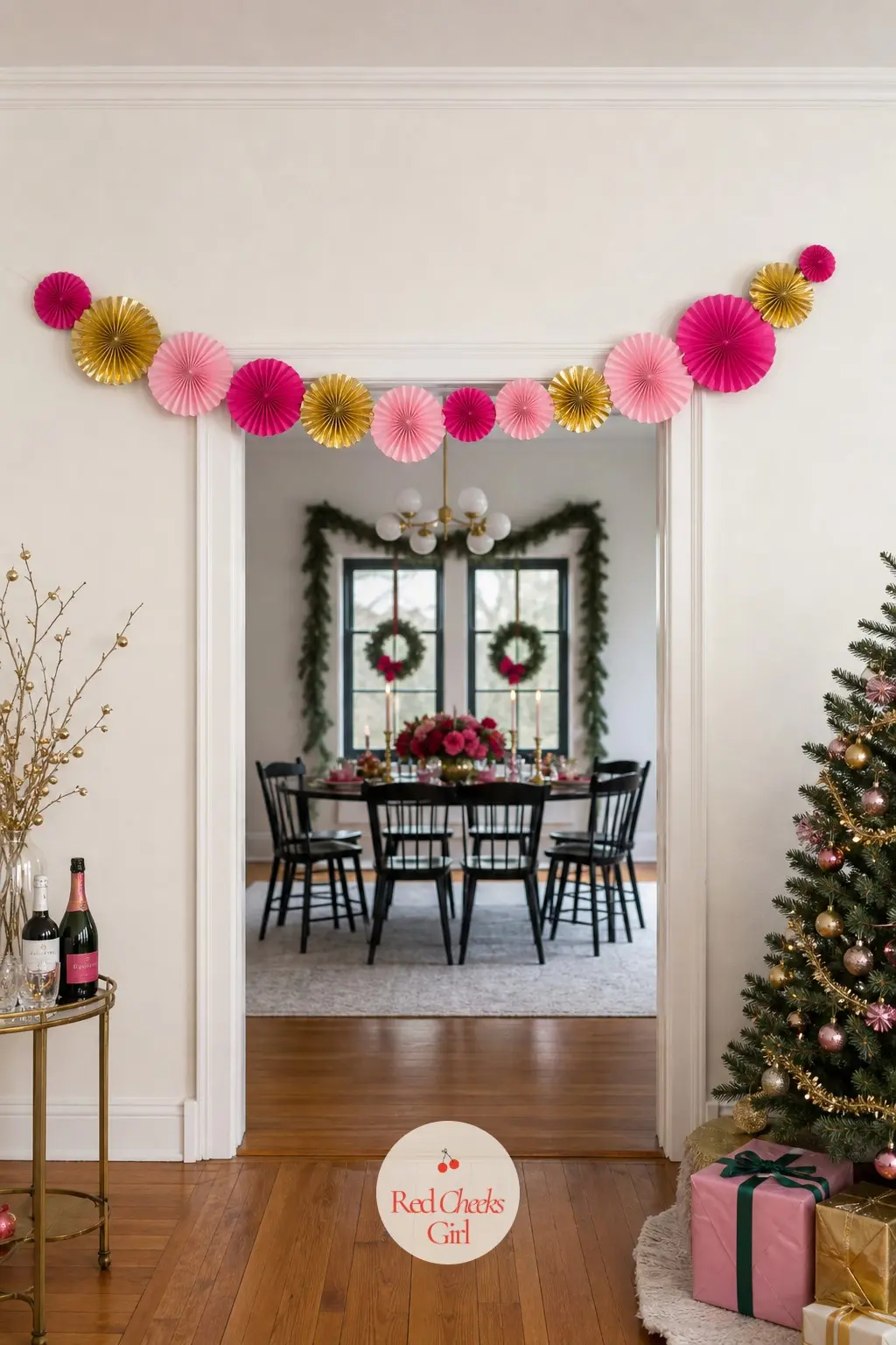 A Tissue Paper Medallion Garland Strung Corner to Corner Over a Doorway — Tissue paper medallions cost almost nothing and fold flat for storage, which makes