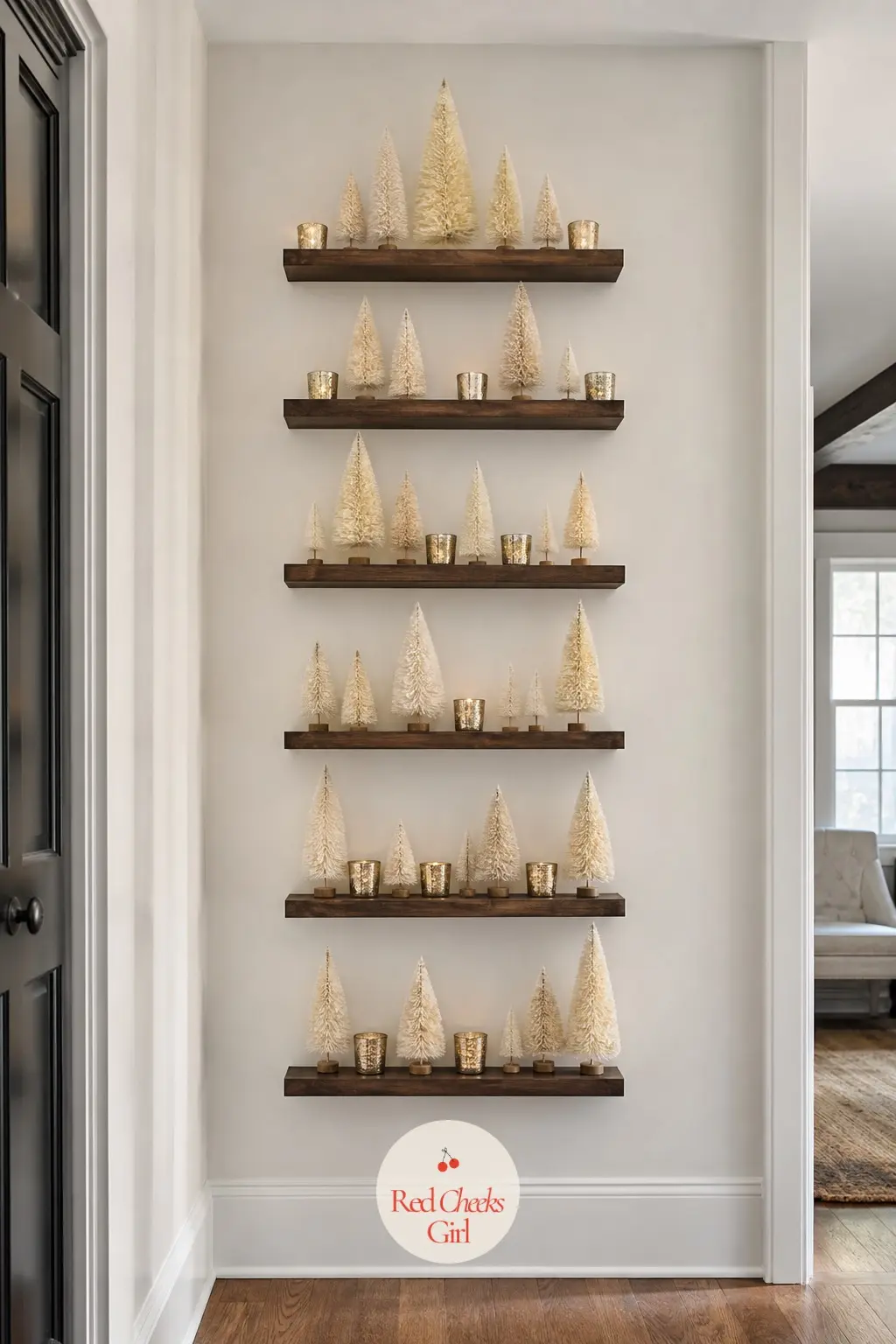 A Vertical Row of Picture-Ledge Shelves Styled With Mini Bottle Brush Trees — Picture ledges hold decor without a single large hole, just a couple of screws