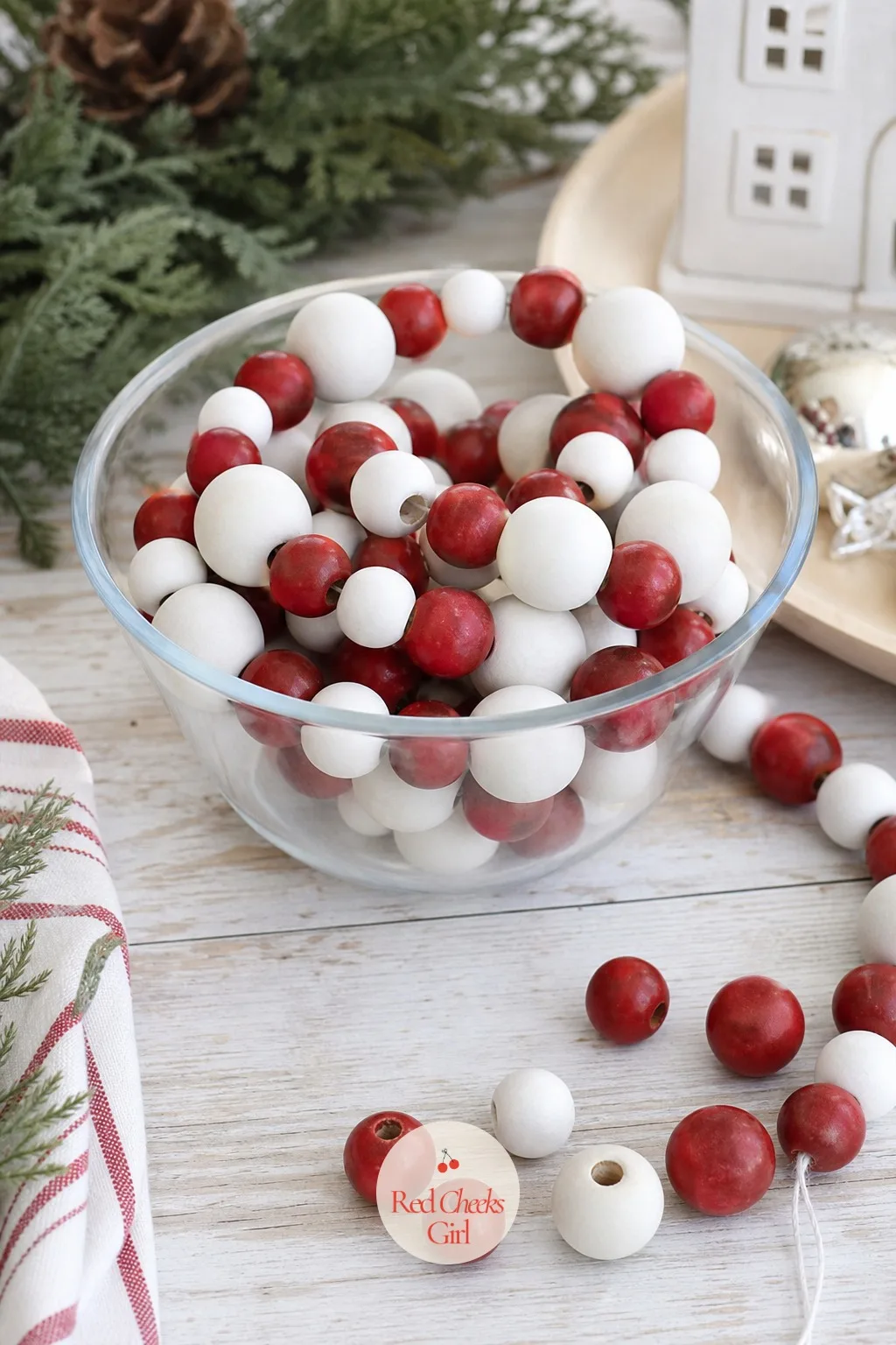 Wood Bead Garland Bowl Filler — An empty glass bowl on the coffee table looks unfinished the second the party starts. Christmas wood crafts