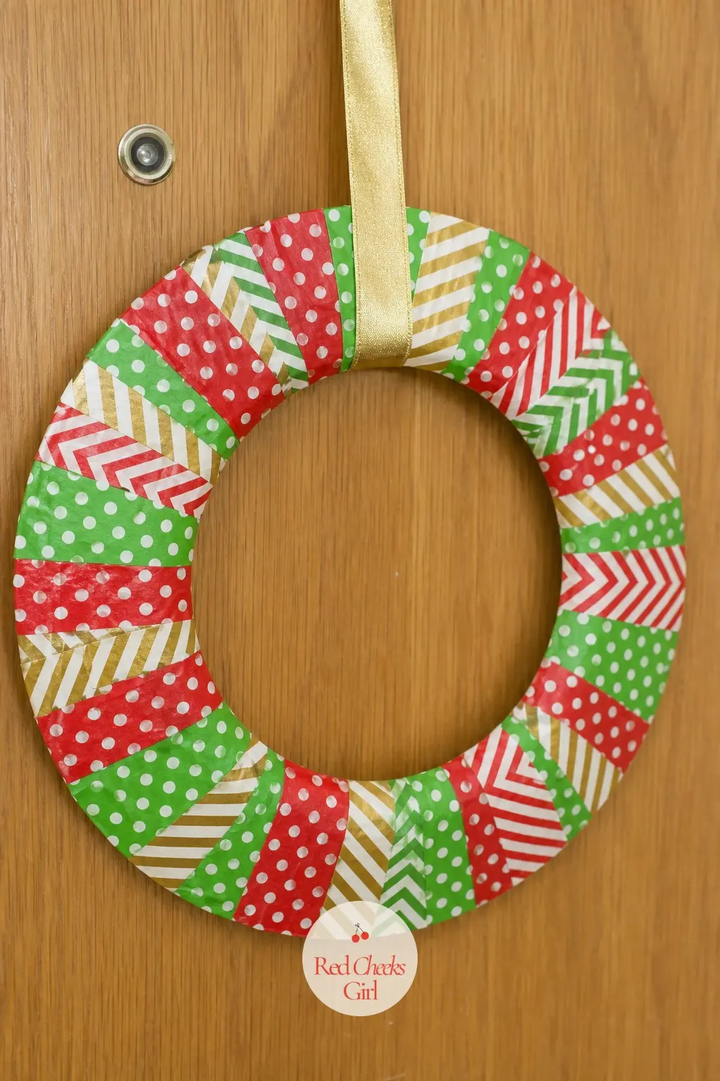 Washi Tape Stripe Wreath — Tear or snip strips of patterned red, green and gold washi tape and layer them across a paper plate ring at slightly different