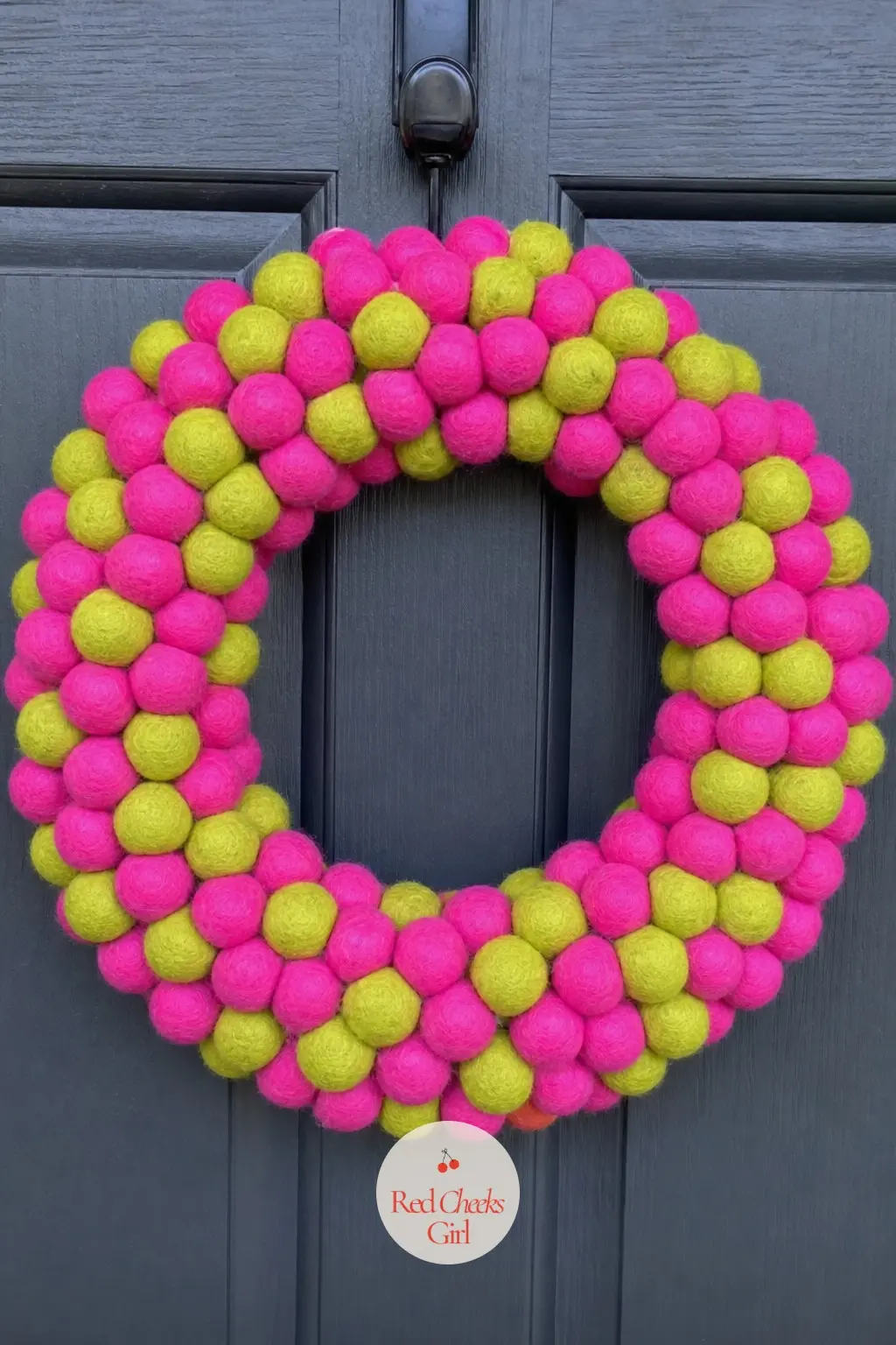 Hot Pink and Chartreuse Felt Ball Wreath — Dozens of felted wool balls in hot pink and chartreuse, packed tight on a plain wire ring. Christmas wreaths for