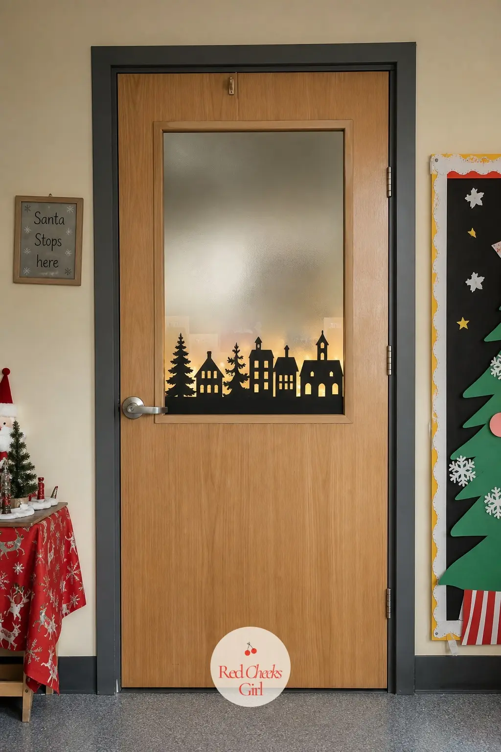 A Frosted Village Silhouette Taped to the Door Glass — Cut a skyline of simple house and tree shapes from black cardstock and tape them along the bottom of the