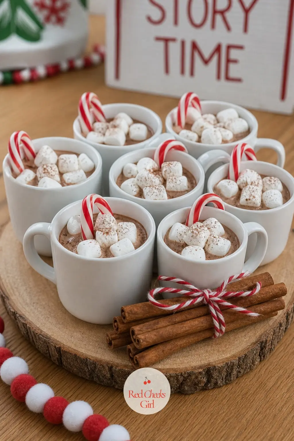 A Hot Cocoa Mug Centerpiece on the Story Time Table — Group a few small white mugs on the table where story time books get stacked, each one filled with faux