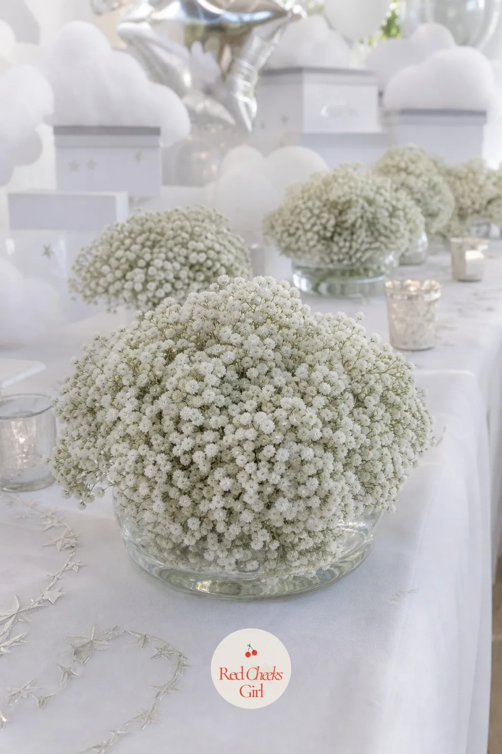 Baby's Breath Arranged in Cloud Shapes — Big floral arrangements can swallow a table and block conversation across it. Cloud 9 baby shower theme