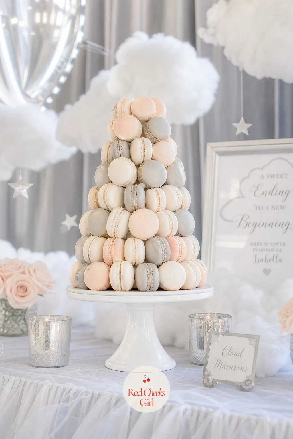 Cloud Macaron Tower — A flat plate of macarons gets lost next to a tall cake. Cloud 9 baby shower theme