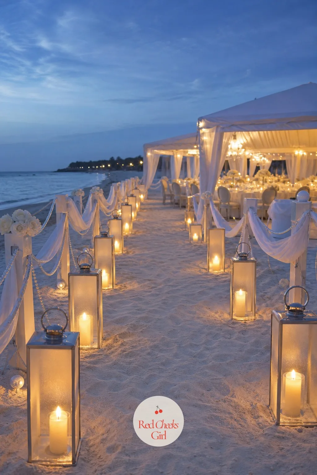 A Lantern-Lined Pathway to the Reception — The walk between the ceremony and the party is dead time unless someone dresses it, and in failing light it is also