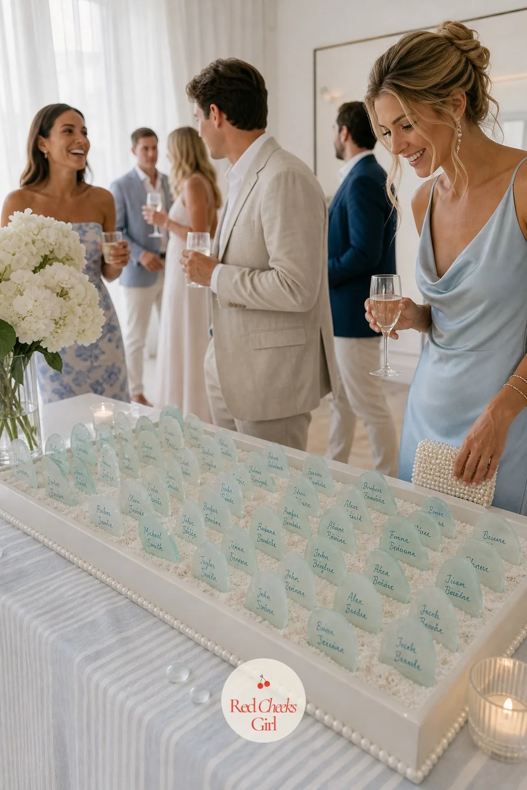 A Sea Glass Escort Card Display — Nobody wants to hunt for their seat with a drink in one hand, and a wall of plain cards does nothing for the room. Coastal