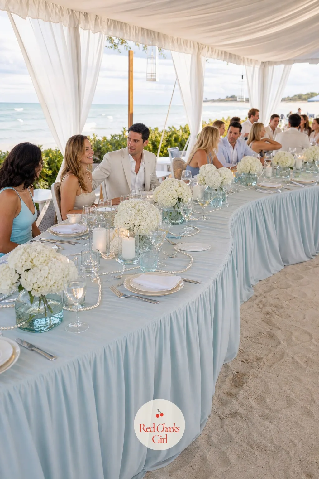 Wave-Shaped Guest Tables with Soft Gathered Cloths — Straight banquet rows can feel like a conference room no matter how nice the flowers are. Coastal wedding