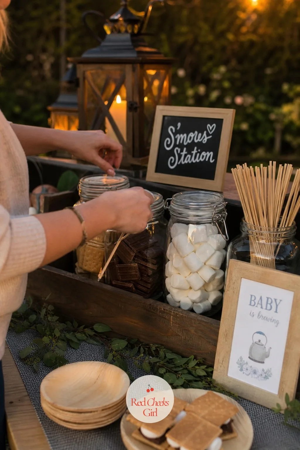 Lantern-Lit S'mores Station — A dessert table of cupcakes is fine and completely forgettable. Coed baby shower ideas