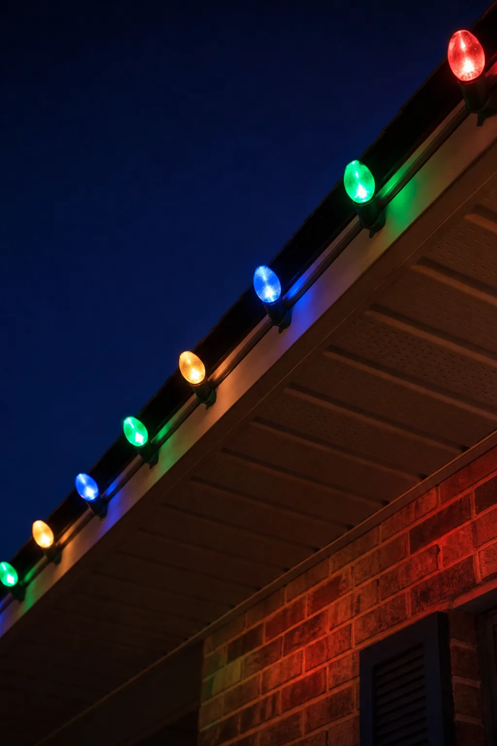 Big C9 Bulb Roofline in Classic Four-Color Rotation — This is the look you are picturing when you say "the way houses used to do it": fat bulbs, true colour