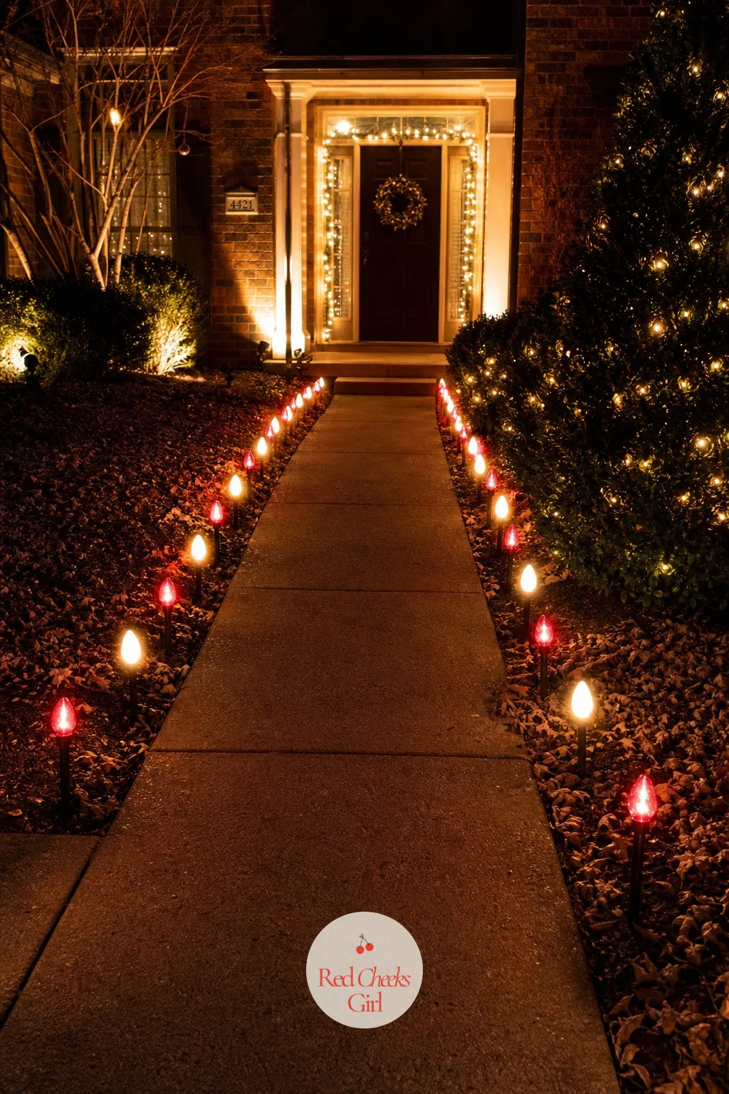 Red and White Color-Changing Lights Lining the Front Walk — A facade is something guests look at, a walkway is something they actually move through, and this