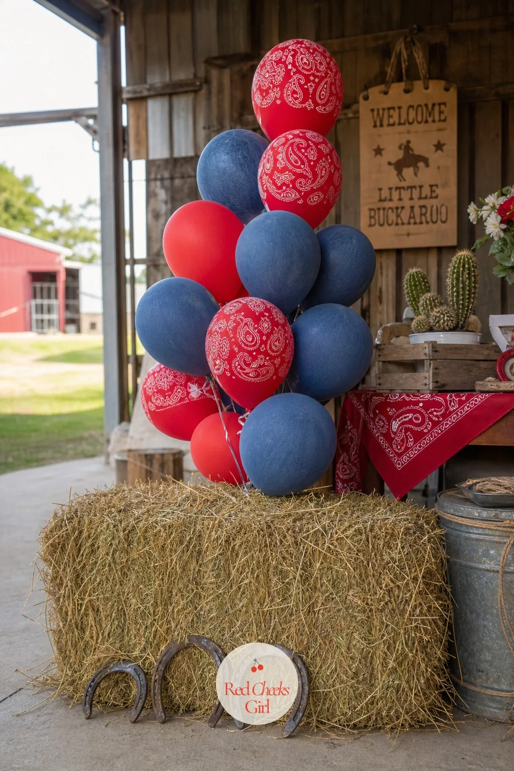 Hay Bale Balloon Base — Skip the plastic balloon stand entirely and let a real hay bale carry the arch instead, with the balloon cluster rising straight up out