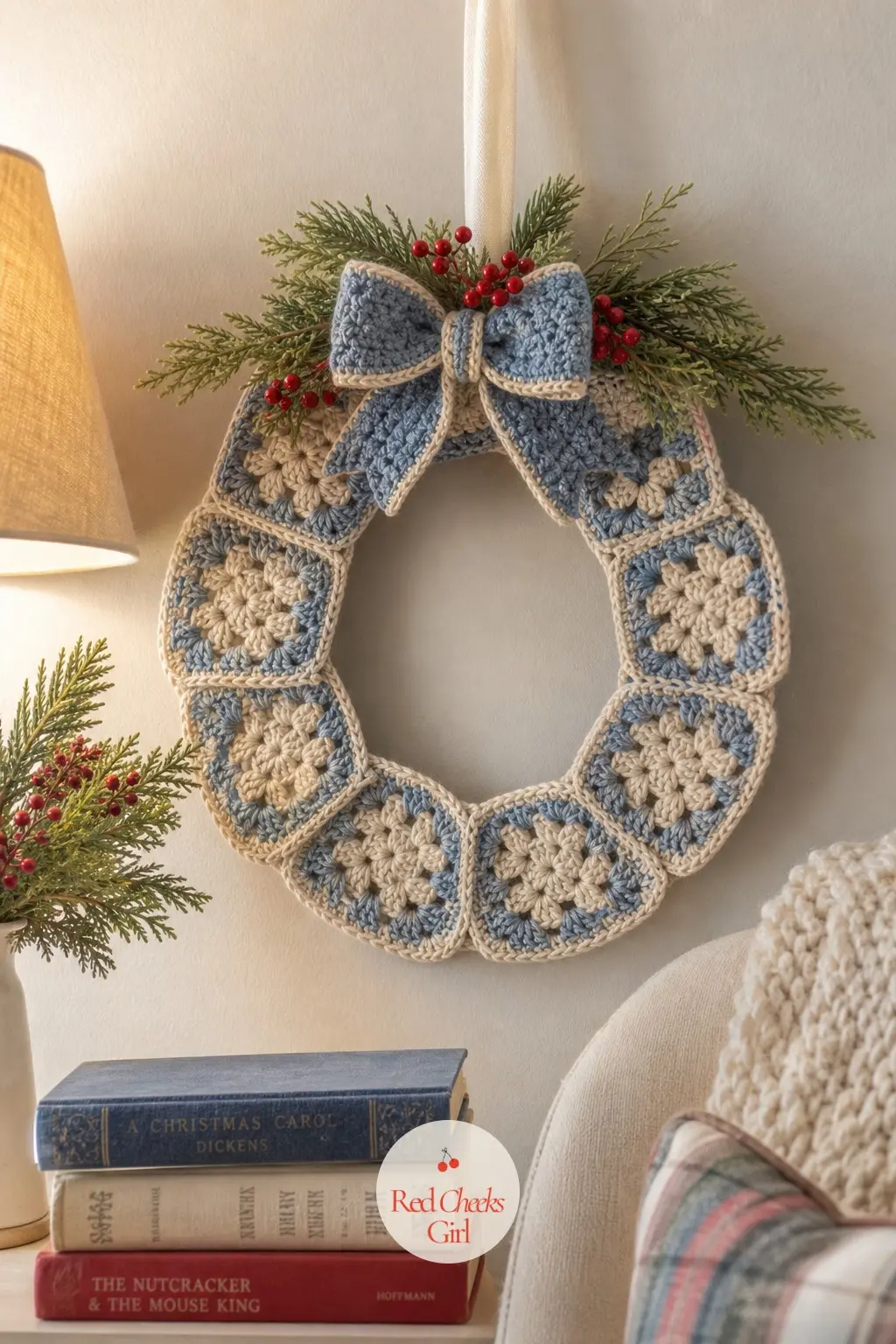 The Denim Blue and Oatmeal Granny Square Wreath for the Reading Nook — Denim blue squares with oatmeal borders hang above an armchair instead of a door, giving