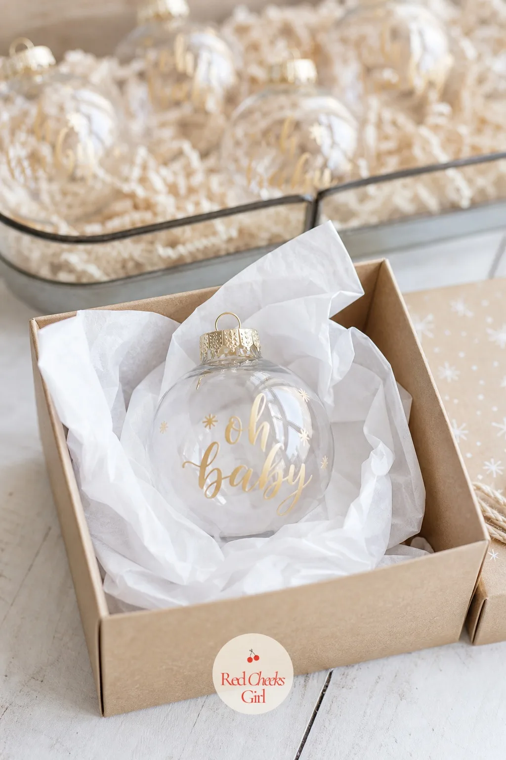 Ornament Favors — Each guest leaves with one glass ornament, personalized with the date or the baby's initial in gold paint pen, nested in a small box lined