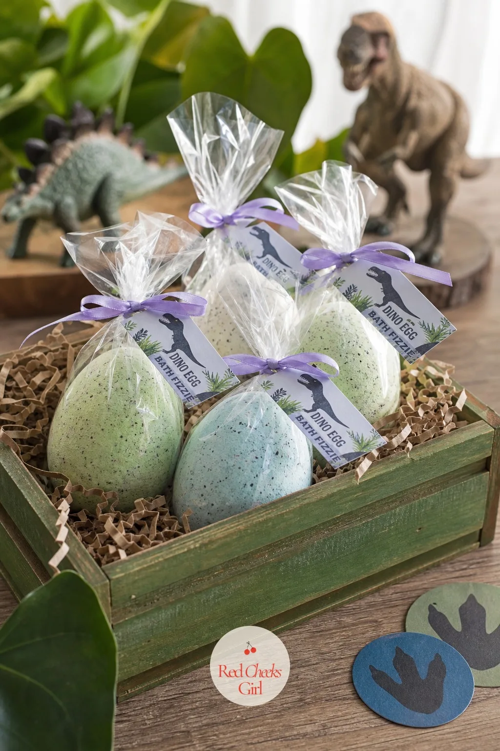 Dino Egg Bath Fizzy Favors — Not every parent wants more sugar leaving the party in a small fist, and a bath fizzy shaped like a speckled egg solves that