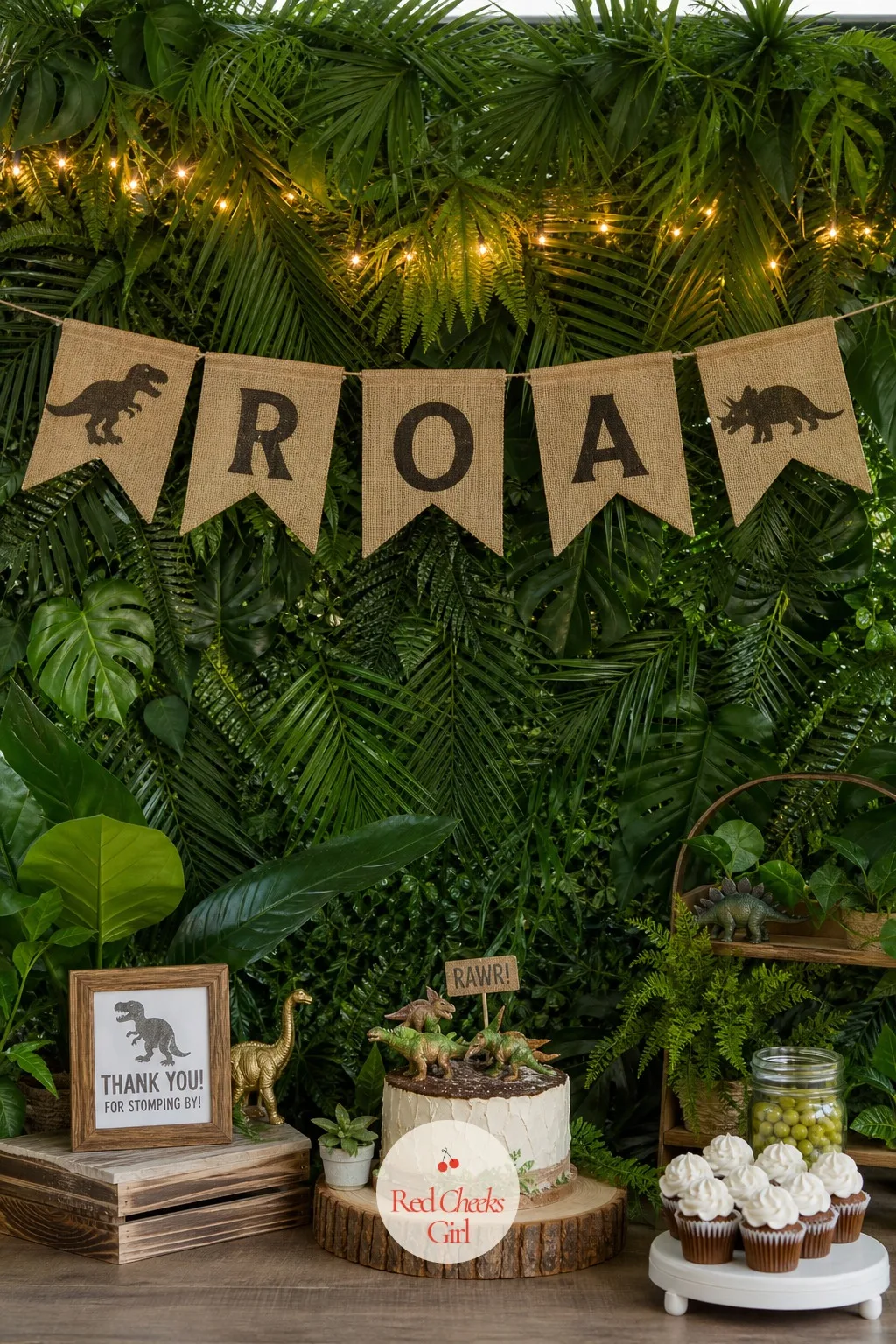 Jungle Foliage Backdrop Wall — A blank wall behind the cake table photographs like an afterthought, and this fixes it without a single nail if the venue will