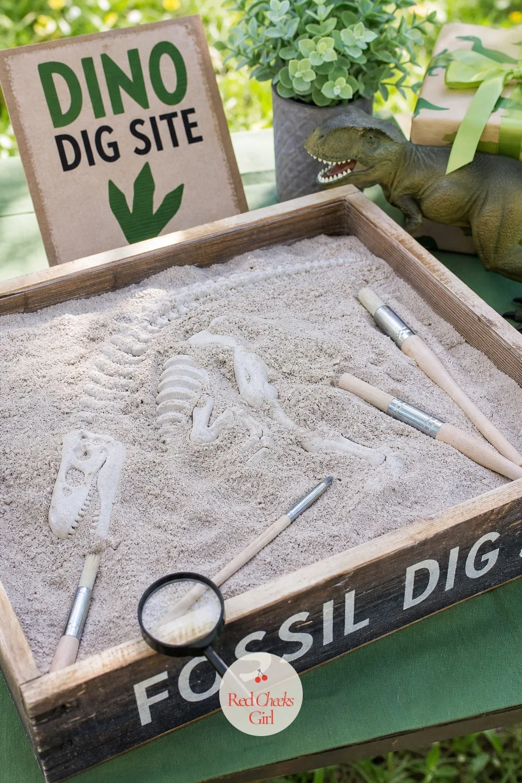 Sandbox Fossil Dig With Paintbrushes — A child who loves dinosaurs loves the digging more than almost anything else on this list, and a shallow bin of sand