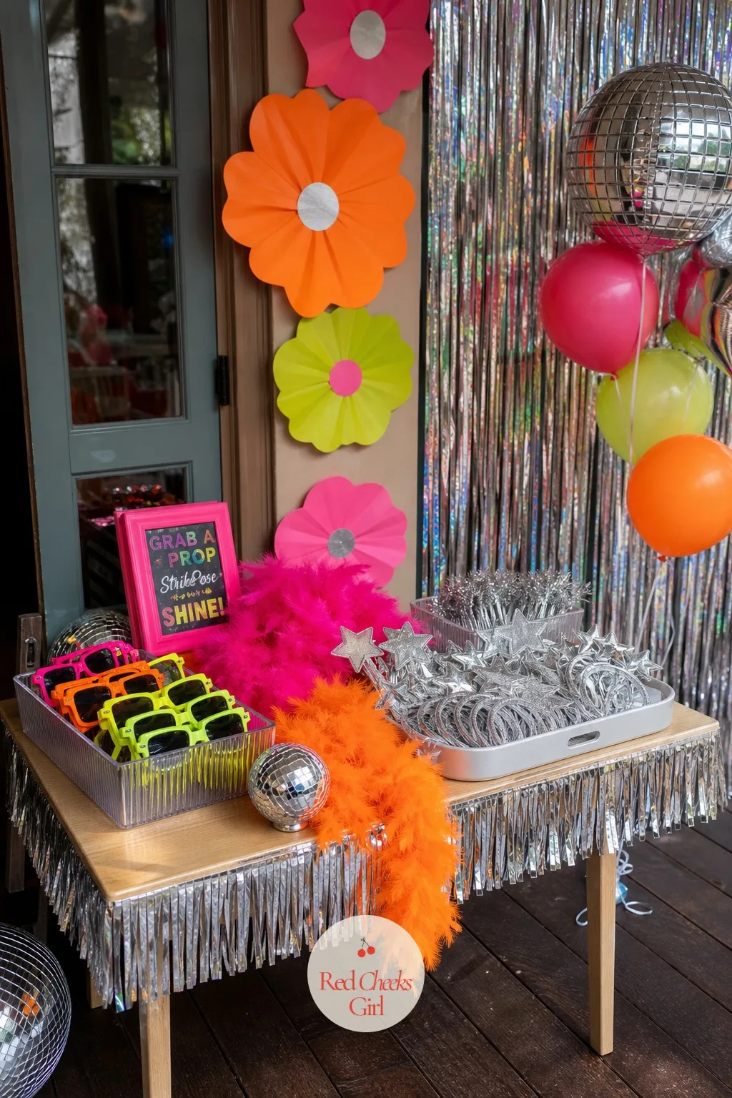 Dress-Up Prop Table at the Door — Half the fun of a disco party happens before anyone starts dancing, at the box by the door. Disco themed birthday party