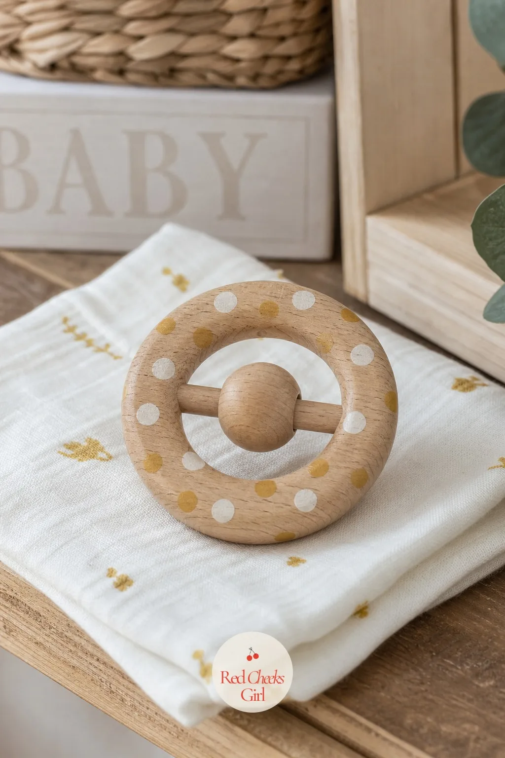 Hand-Painted Wooden Rattle — A rattle that ends up in a baby's mouth within the week needs to be finished with something you would not mind on your own hands.