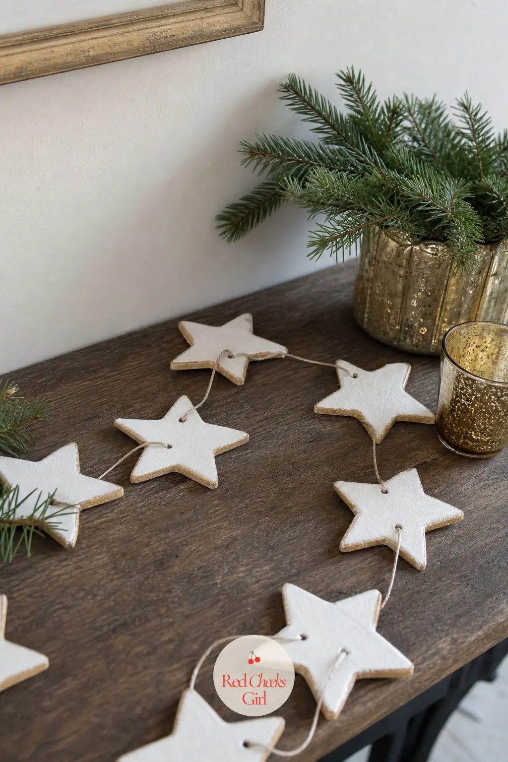 Air Dry Clay Star Garland — Rolled and cut air dry clay stars in plain white with a light gold rub-on finish keep this one restrained rather than crafty