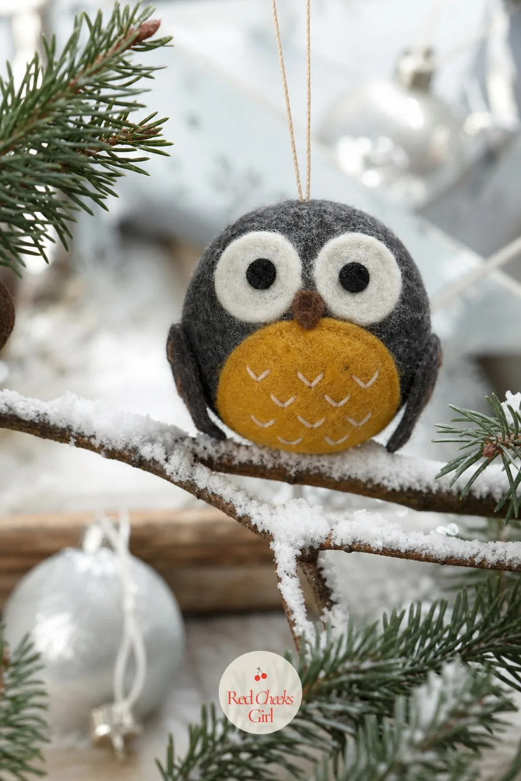 Felted Wool Owl — Charcoal and mustard is a colour pairing most tree decorations never reach for, which is exactly why this one stands out against a sea of red