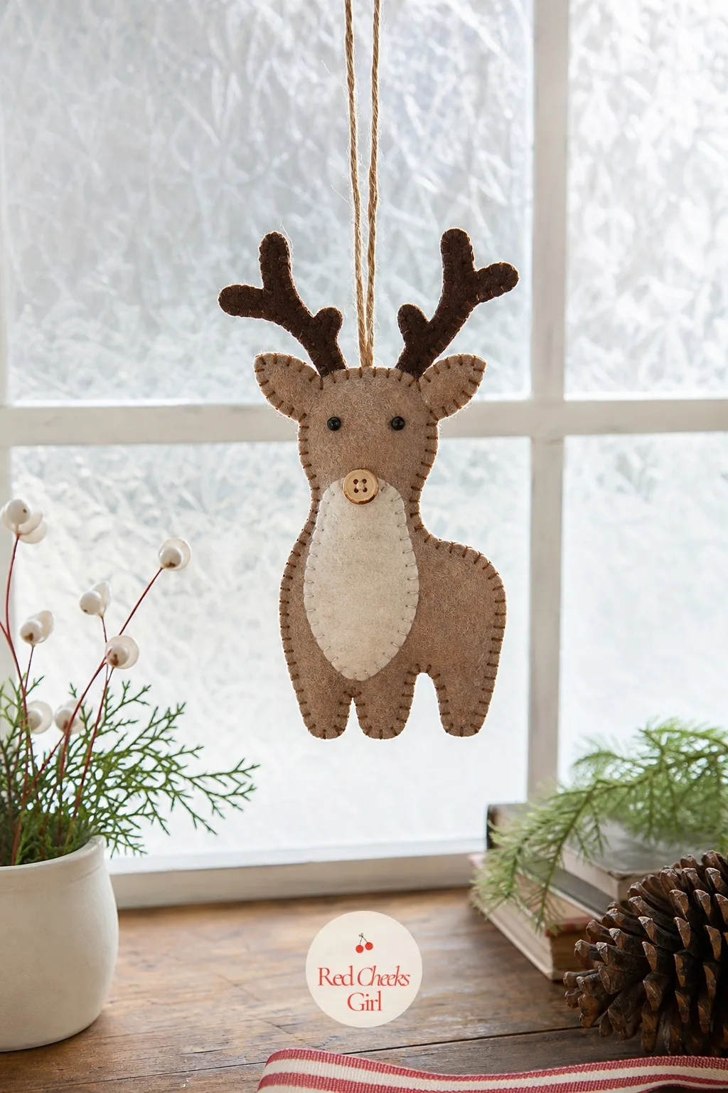 Hand-Sewn Felt Reindeer — The reindeer is the one worth actually sewing, since the antlers want a firm seam to keep their shape rather than a glued edge that