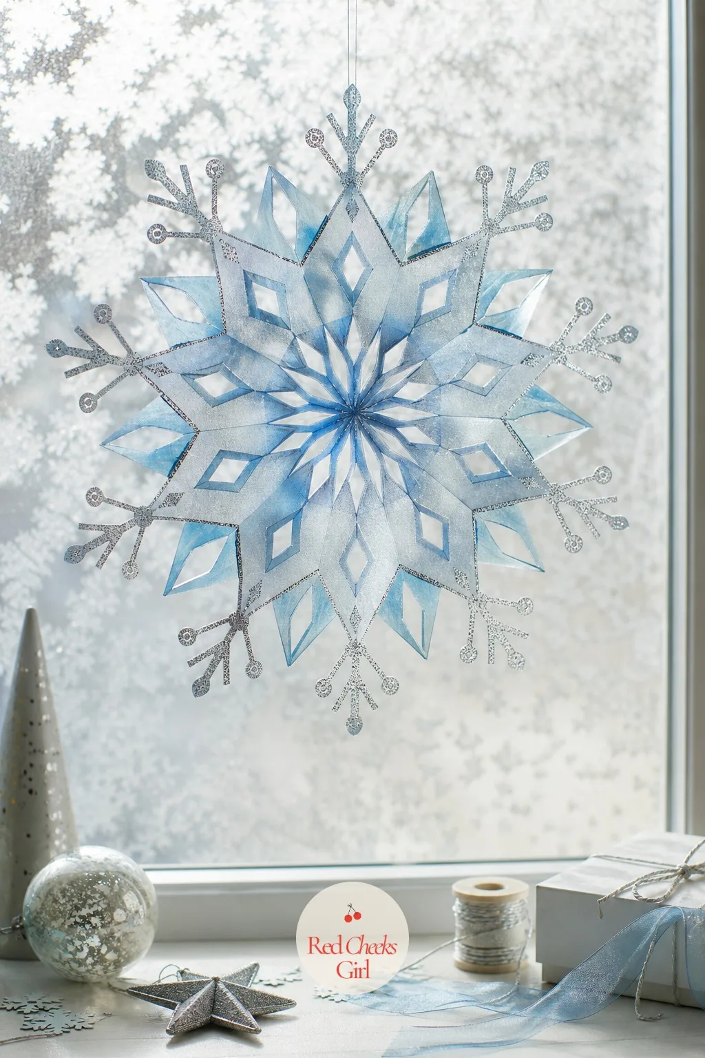 Icy Vellum Snowflake — Fold a square six times, snip a few shapes out with small scissors, and the unfolding is the whole reward, every single one comes out