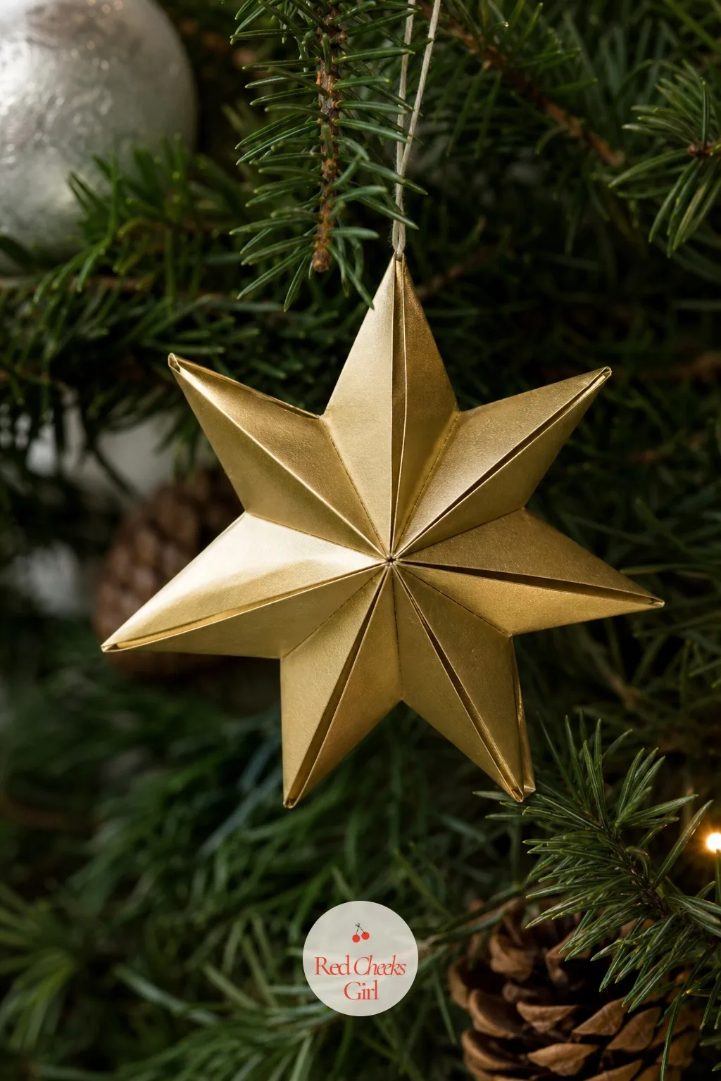 Metallic Origami Star — A flat sheet, eight folds, and suddenly you have a star with real facets, the kind that catches lamplight instead of just hanging