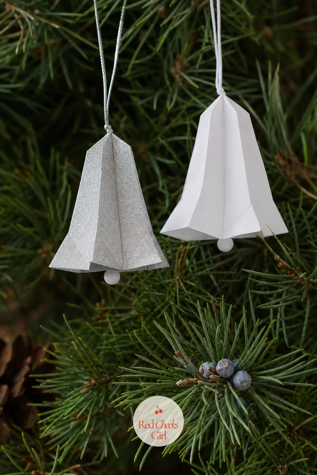 Punch-And-Fold Silver Bell — Print a scored bell template, fold on the lines, glue one seam shut, and a flat sheet becomes a dimensional bell with no cutting