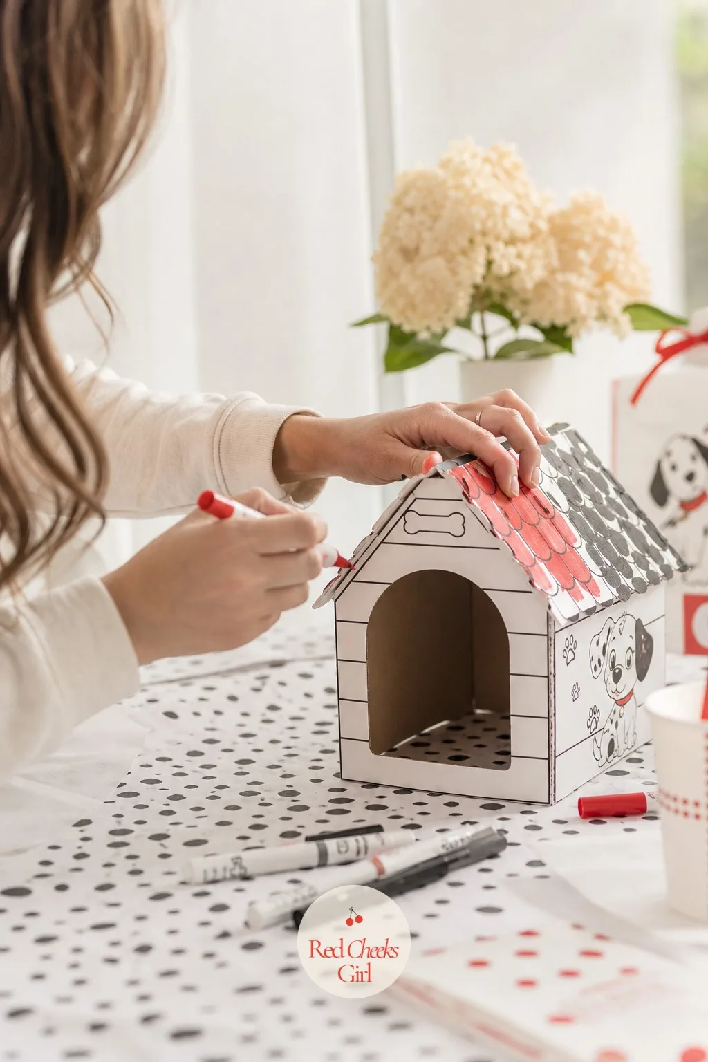 Cardboard Doghouse Coloring Station — Give a child a flat cardboard shape and a box of markers and watch the table go quiet for ten straight minutes, which