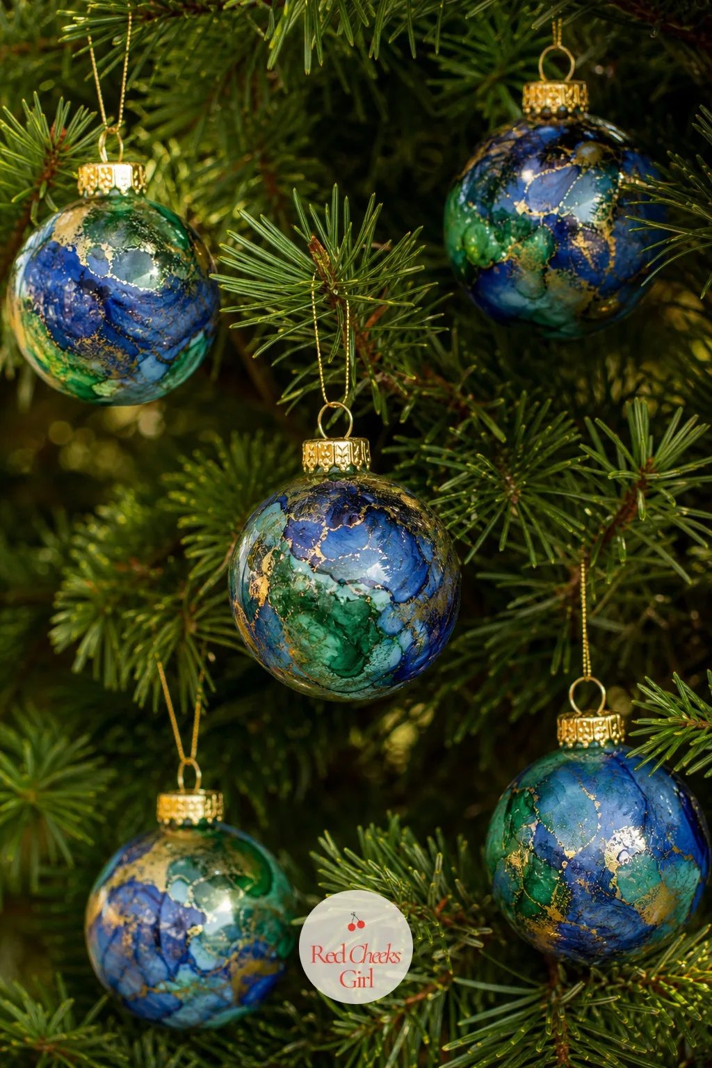 Alcohol-Ink Glass Bauble Ornaments — Plain glass balls from the three pack look fine, right up until they sit next to anything handmade. Easy christmas crafts