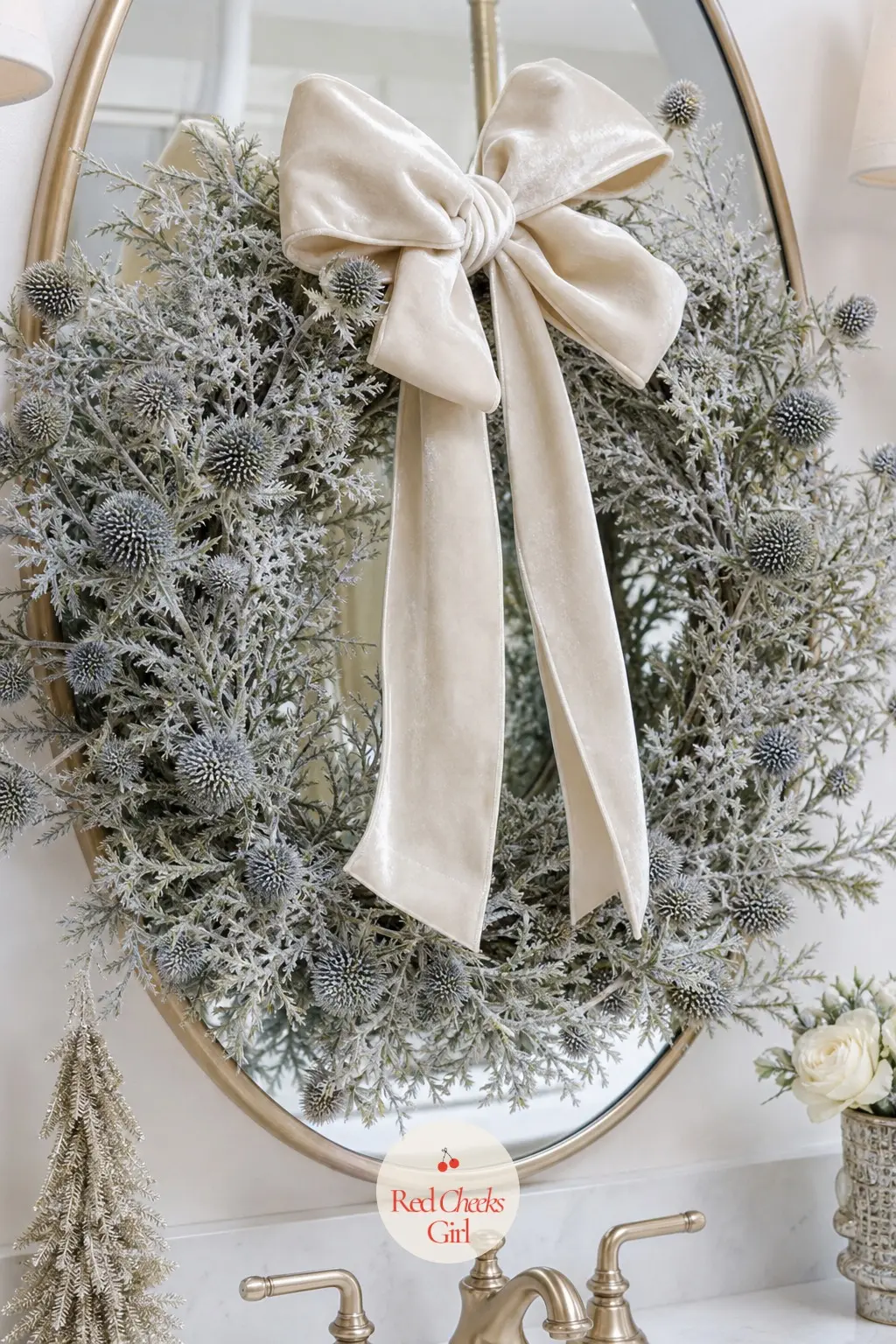 The Ivory Velvet Bow and Frosted Thistle Wreath for the Primary Bathroom Mirror — Thistle stems dusted with frost sit well against a bathroom mirror, where