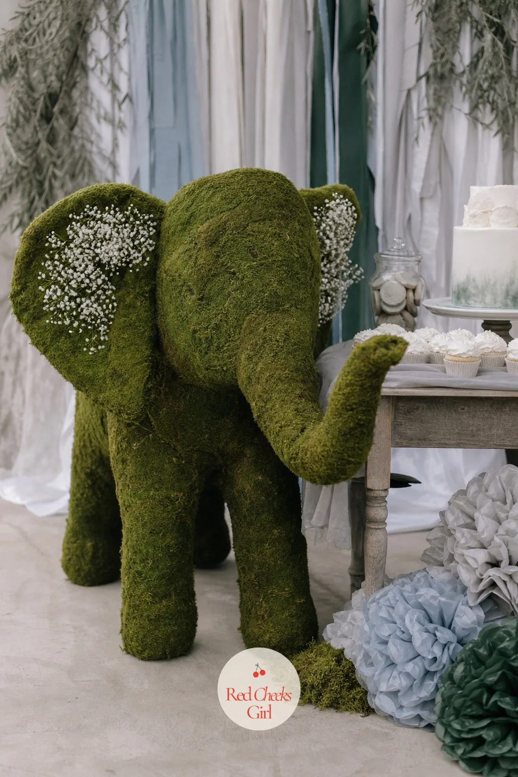 The Giant Moss Elephant — She will say it is too much, right up until she sees it. Elephant baby shower theme