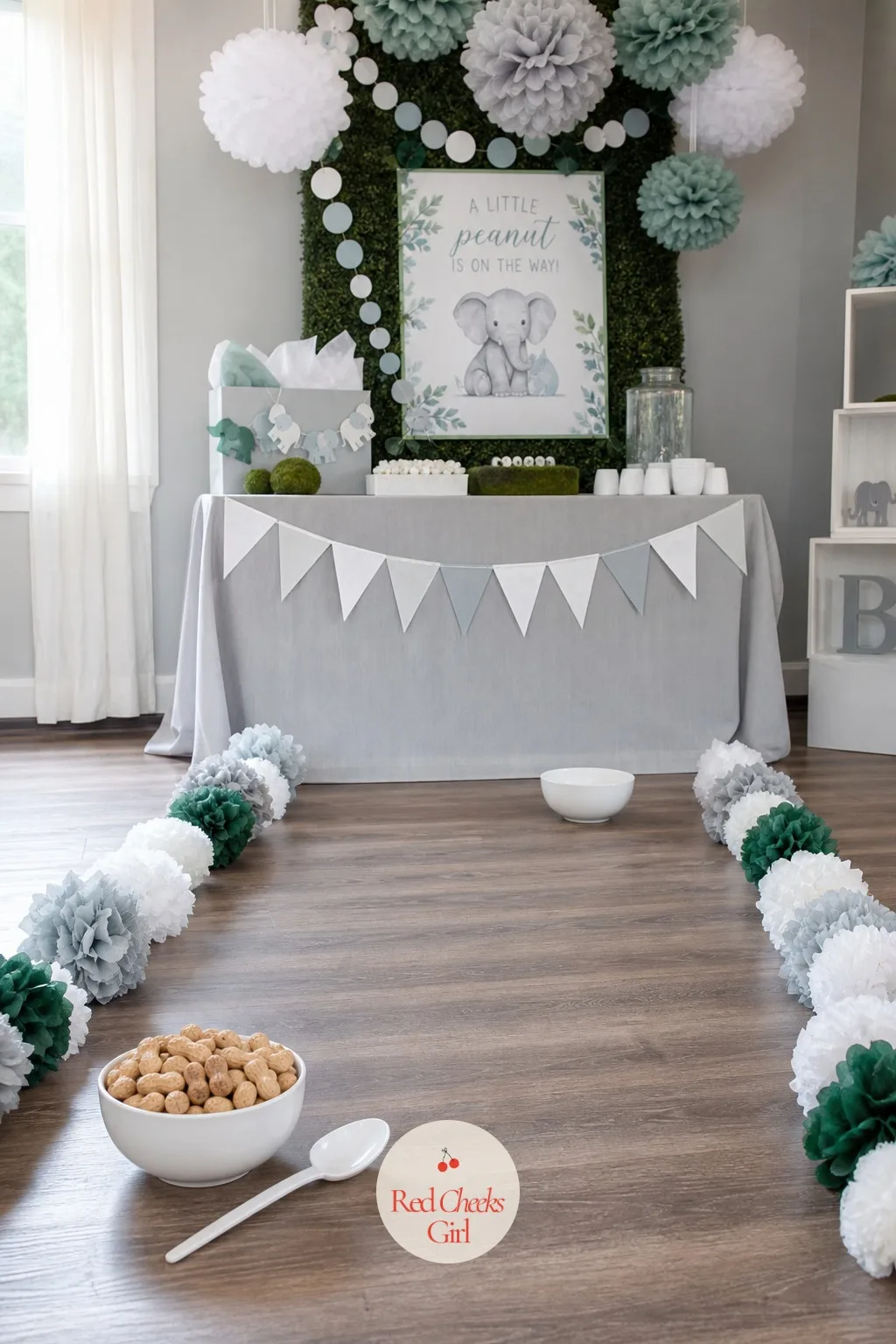 The Peanut Scoop Relay — Split the room into two teams and watch competitiveness show up from guests who swore they were just here for cake. Elephant baby