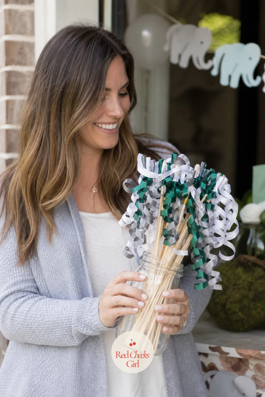Trunk Curl Ribbon Wands — Not every favor needs to be edible, and this one gives guests something to actually hold during toasts and gift opening instead of a