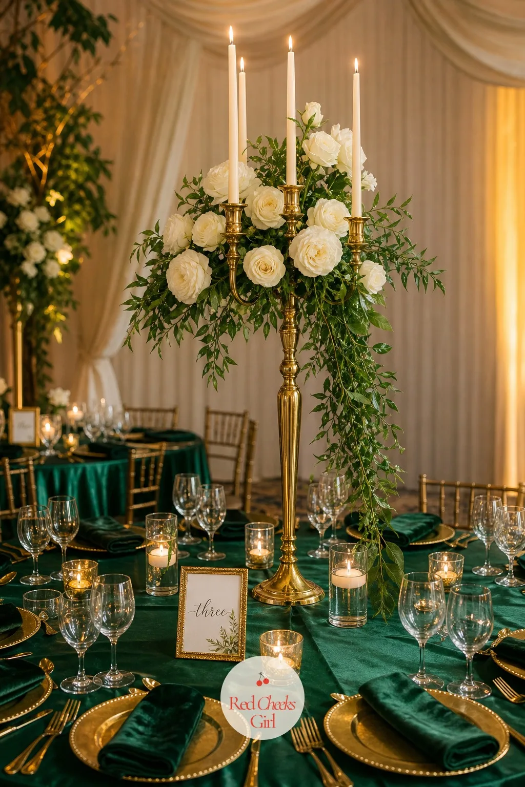 Tall Candelabras with White Roses and Trailing Greenery — Height on the table does most of the romance without adding clutter at eye level. Emerald green
