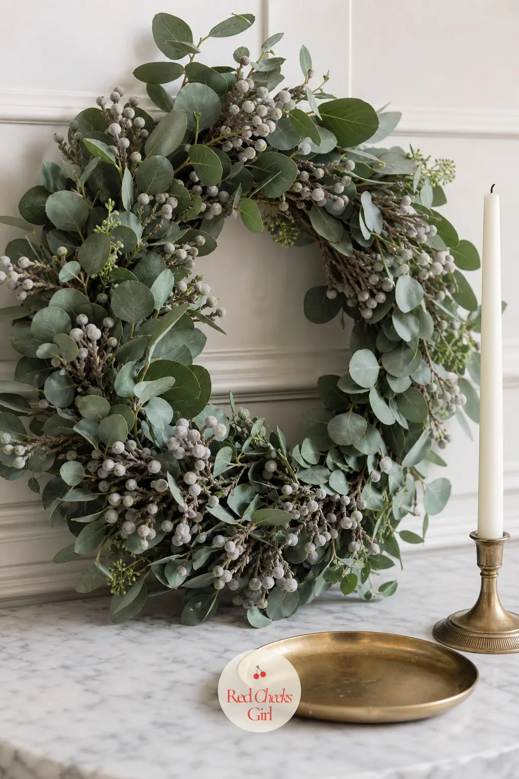 The Eucalyptus and Silver Brunia Wreath for the Entry Console — Silver brunia berries, small and round and genuinely silver rather than painted, scatter