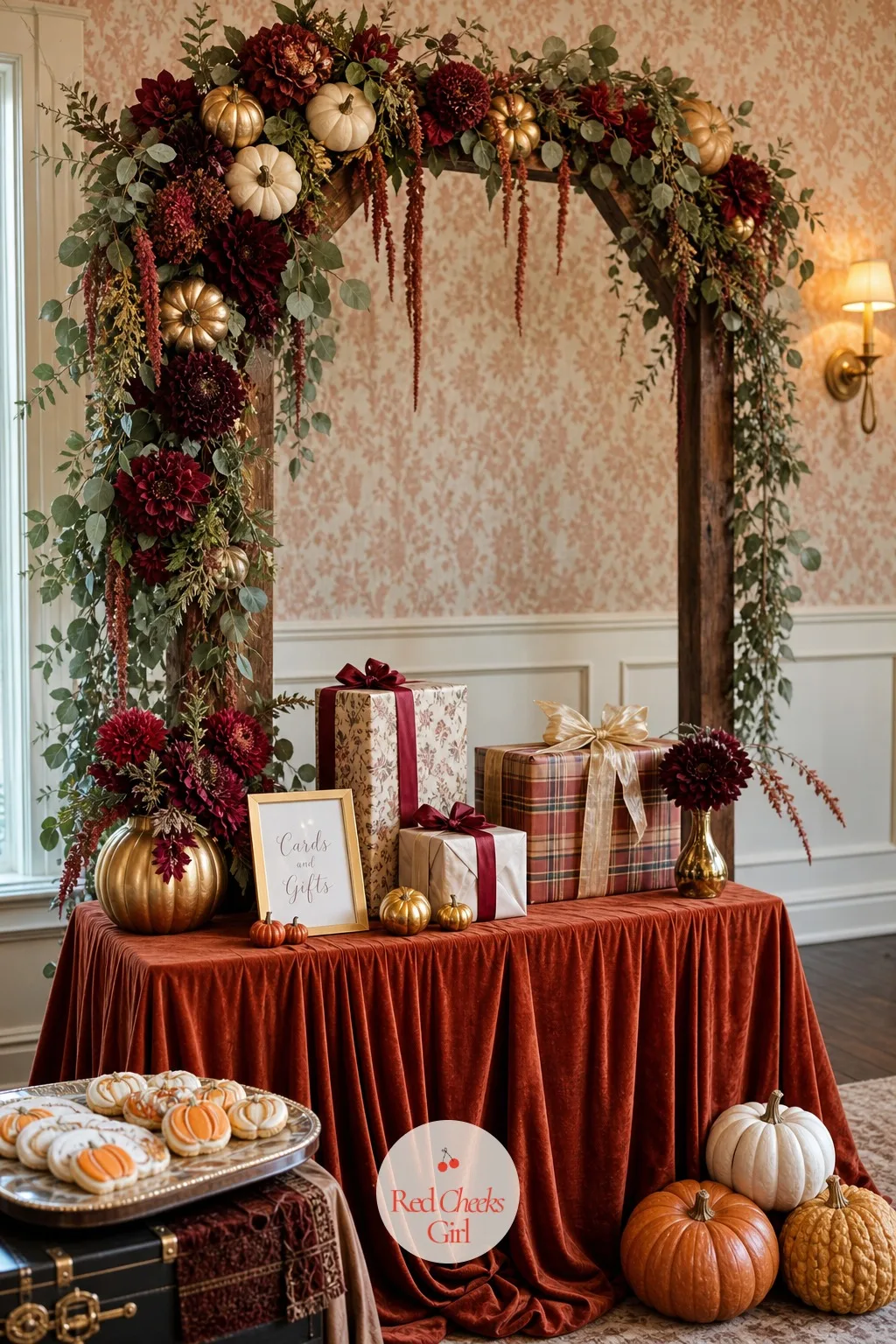 Pumpkin and Floral Backdrop — Every photo from the shower ends up in front of whatever hangs behind the gift table, so that wall earns the budget first. Fall