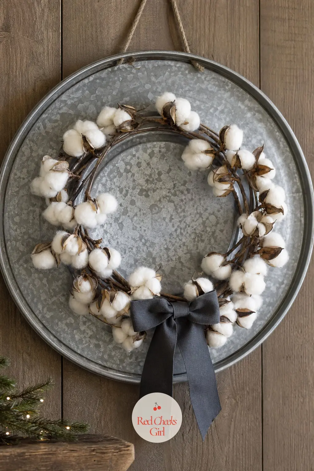 The Galvanized Milk Can Lid Wreath for the Mudroom Bench Wall — A repurposed galvanized milk can lid stands in for the usual wire frame, with a ring of cream
