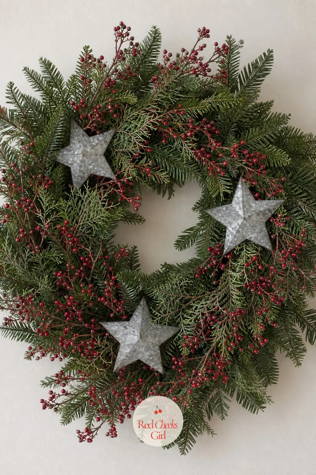 The Galvanized Star and Pip Berry Wreath for the Back Hallway Wall — A flat stretch of hallway wall gets a wreath built around three brushed-silver stars wired