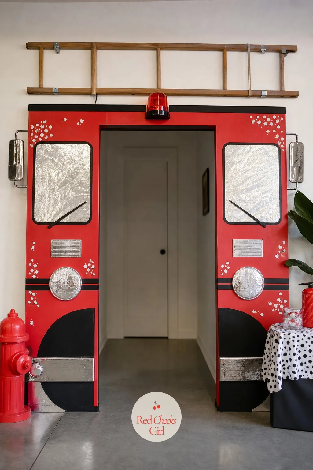 A Life-Size Fire Truck Doorway — She does not need to rent an actual engine for the driveway, and her nerves survive this version just fine. Fire truck