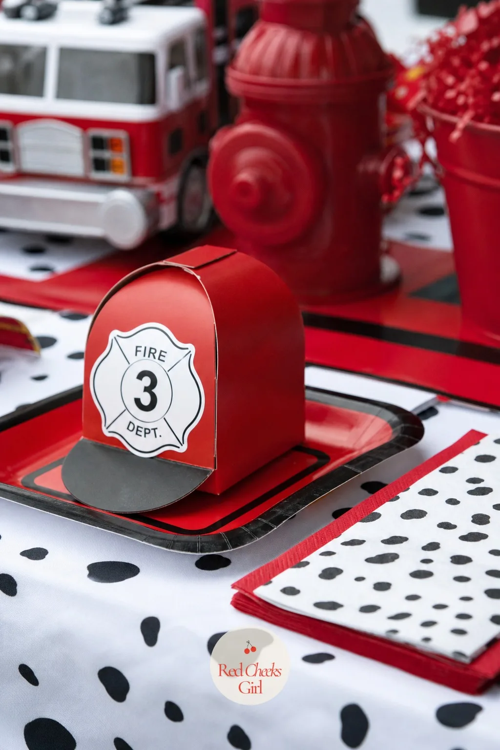 Mini Firefighter Helmet Treat Boxes — A square favour box looks like it came from any party on the street. Fire truck birthday party ideas