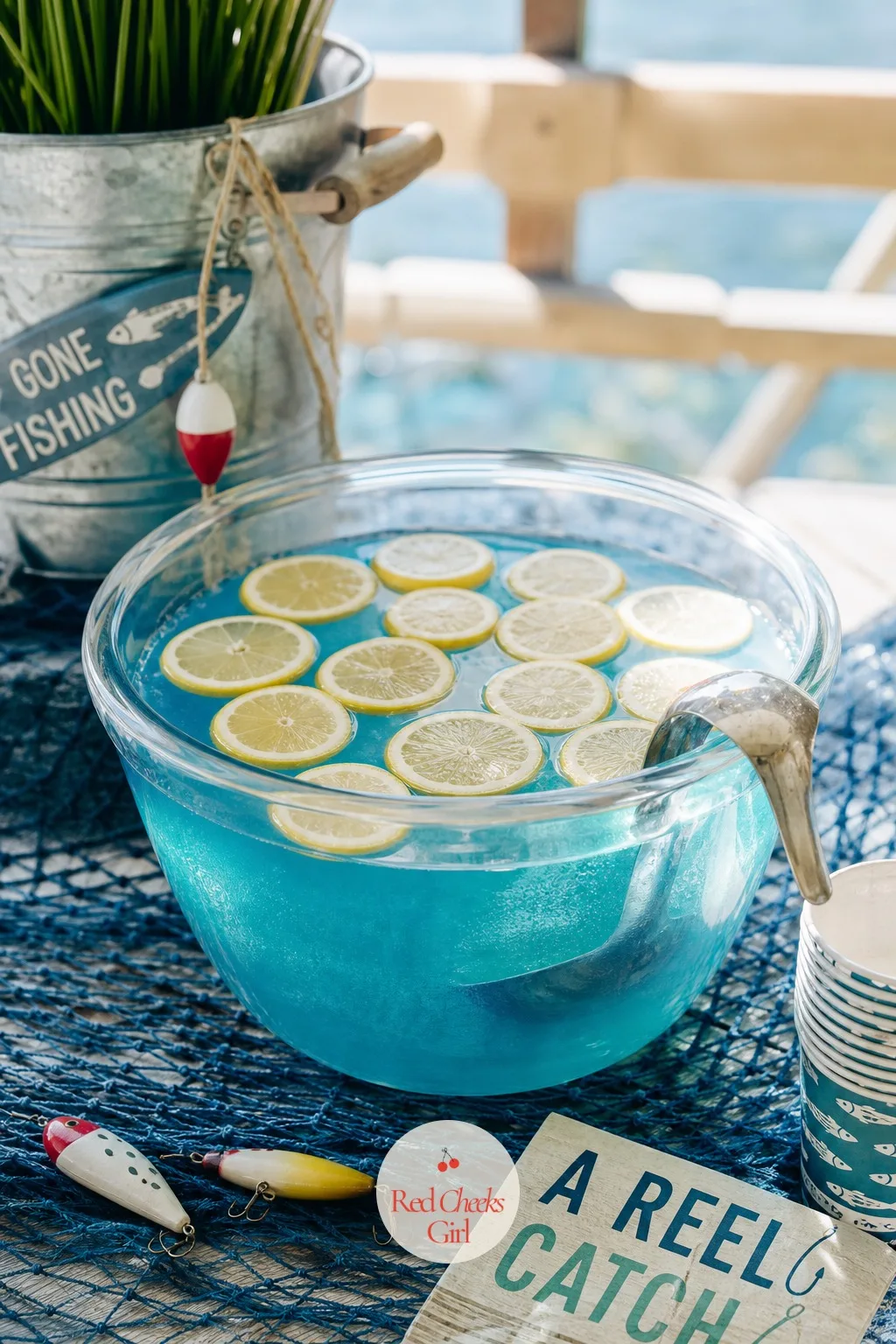 A Blue Lagoon Punch Bowl — A punch that matches the party colors exactly does more for the table than three extra decorations would. Fishing baby shower theme