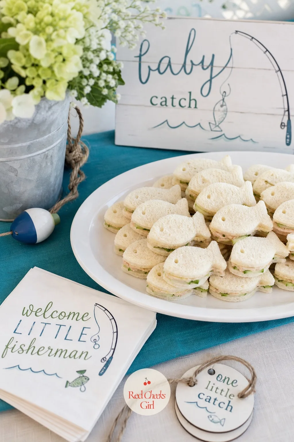 Fish-Shaped Sandwiches — Finger sandwiches at a shower can look like an afterthought cut into sad triangles. Fishing baby shower theme