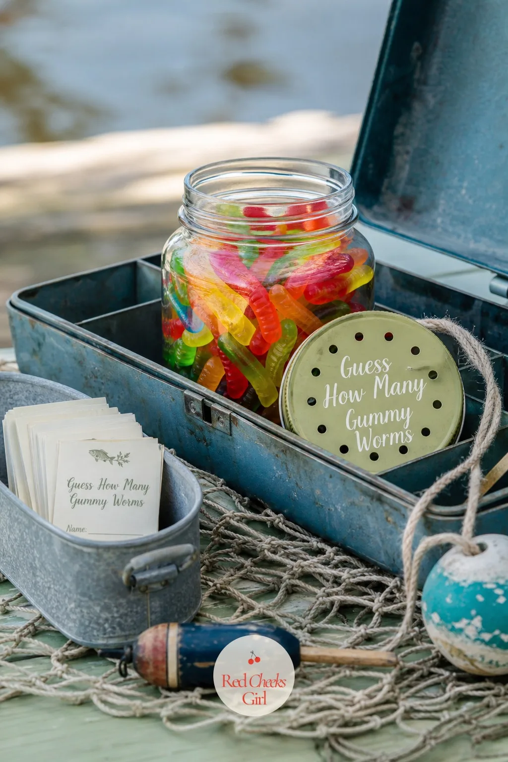 Guess the Gummy Worms in the Tackle Box — The classic jar-of-candy guess works even better once the jar is swapped for something that actually belongs on this