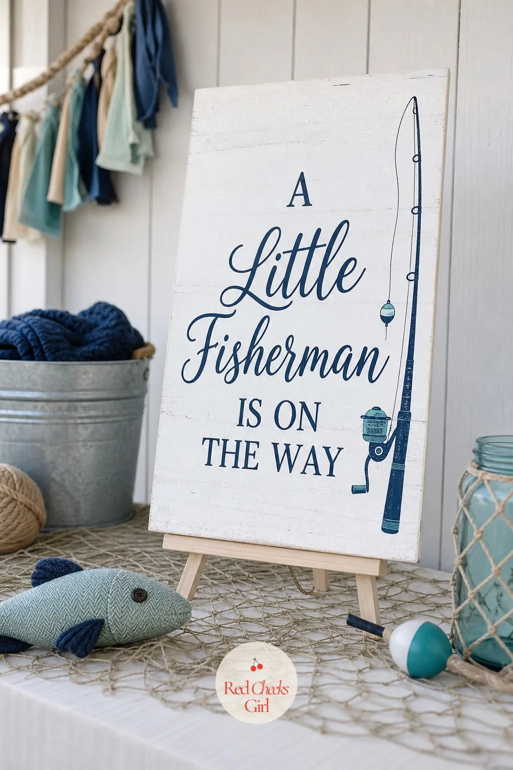 A Little Fisherman Is on the Way Sign — This is the line everyone photographs first, so it has to earn the spot. Fishing baby shower theme