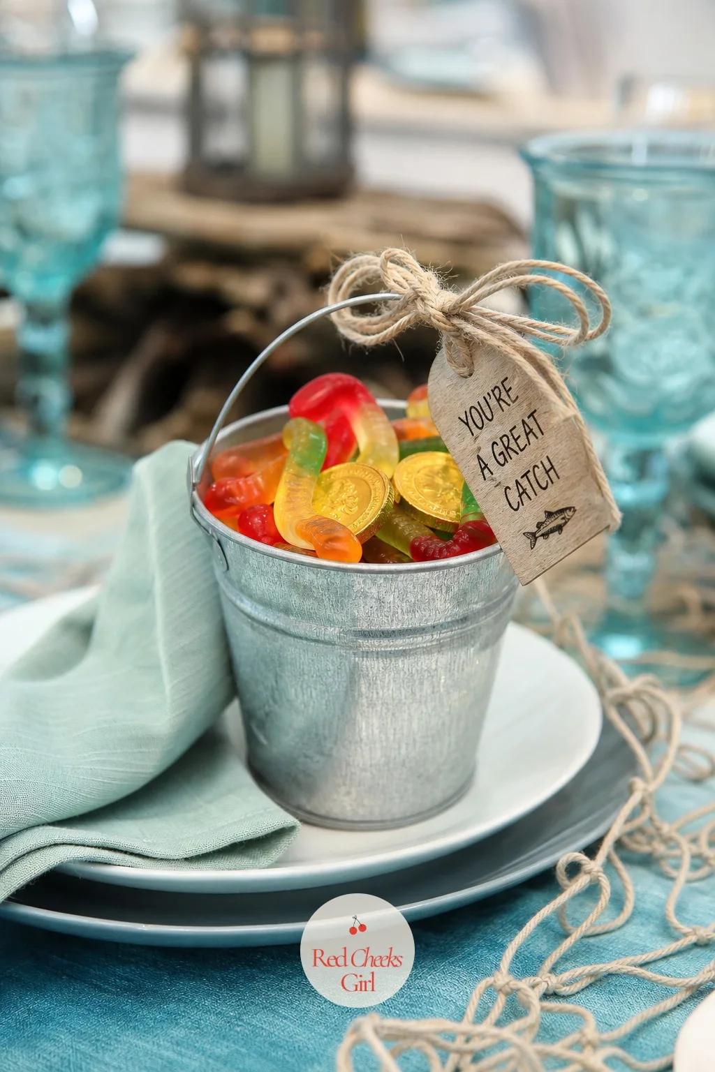 Mini Bait Buckets of Candy — A favor that doubles as a tiny decoration on the table before it goes home with anyone earns its keep twice over. Fishing baby